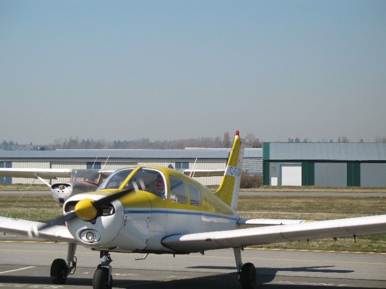 David Marshall taxies back to the ramp in Cherokee GODP after successfully completing his First Solo Flight on April 7, 2009.  Langley Flying School.